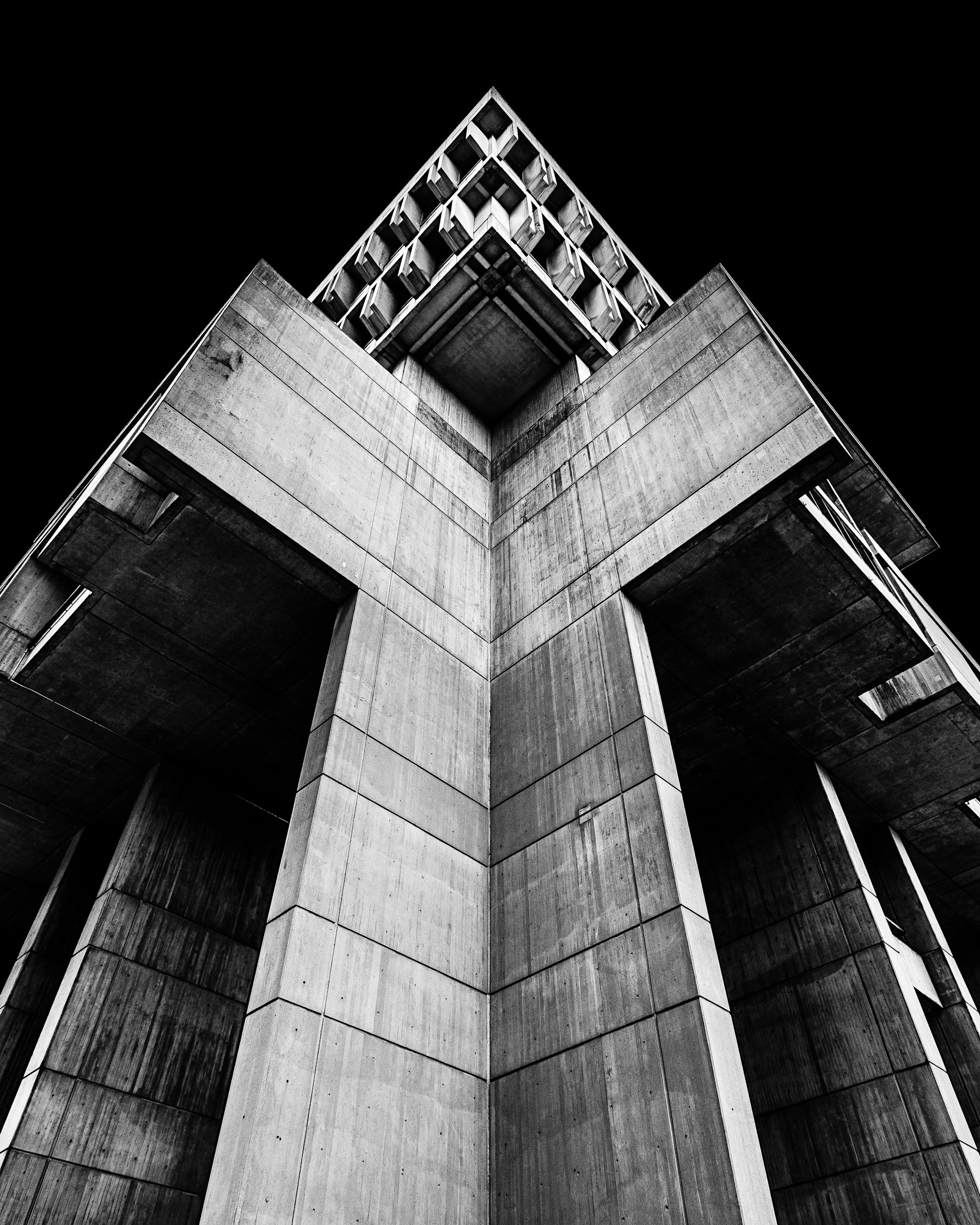 Monumental concrete architecture viewed from below